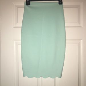 Tight light teal skirt